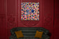 Blue Pearl — room preview on a deep red wall (preview only)