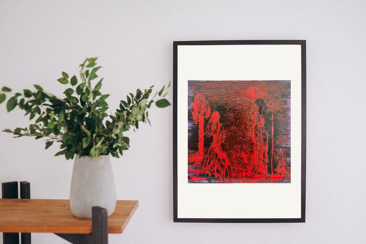 Kama Sutra in a black frame beside a plant table — room preview
